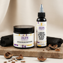 Load image into Gallery viewer, Jilyn Skincare Cleanse and Scrub Duo — Liquid African Black Soap and African Black Soap Scrub styled on stone surface with charcoal and walnut shells